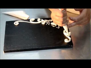 Beautiful cake design by scroll work piping in
