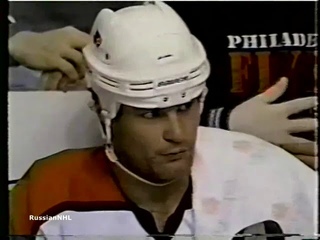 Andrei Nikolishin meets Eric Lindros with his head down and feels bad after it (1997)